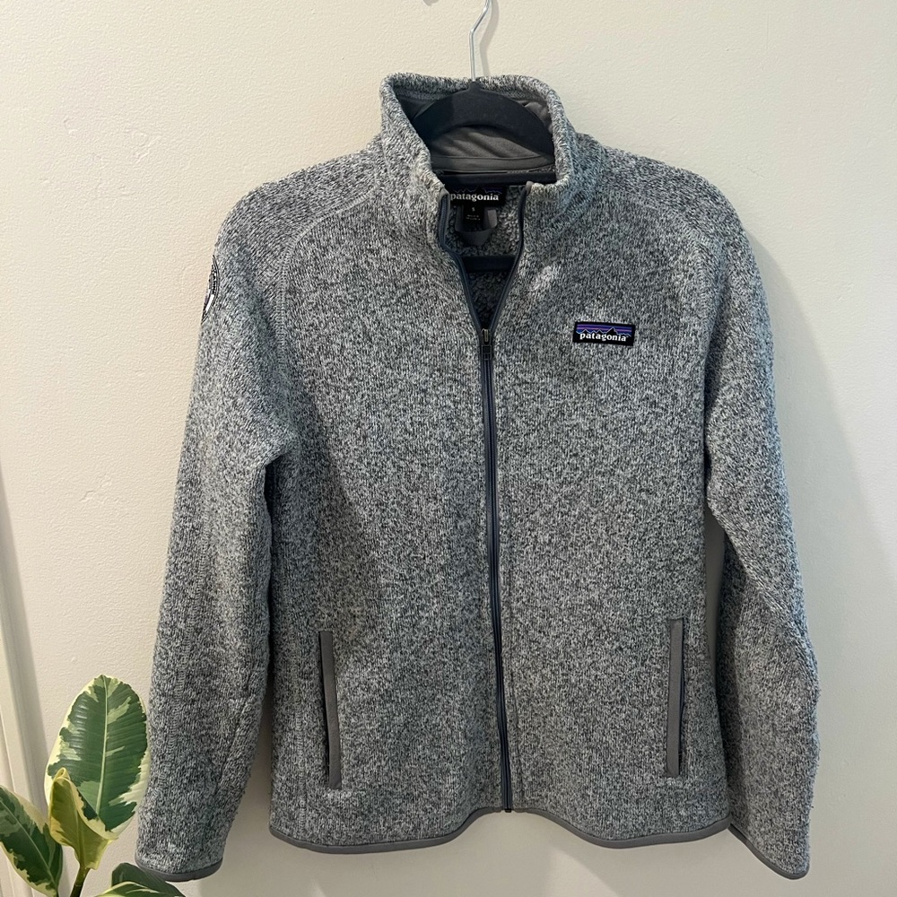 Patagonia grey zip-up jacket with Pepperdine Switzerland Patch